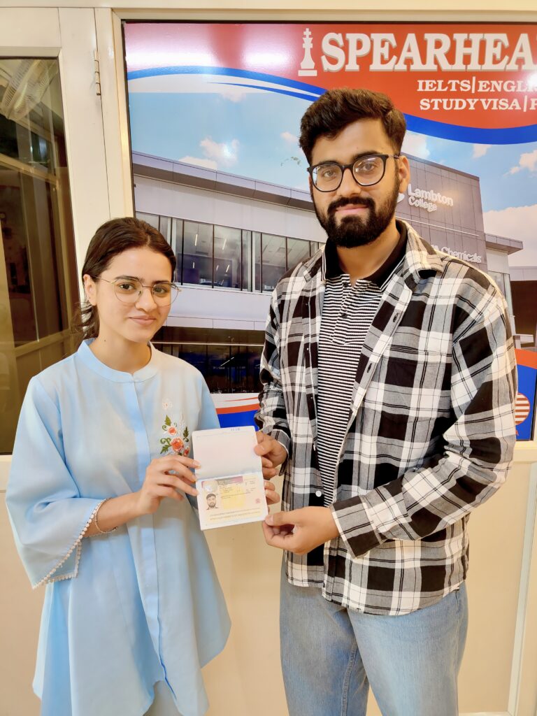 Client visa handover at the Visa Guy parent-brand office